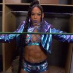 Bianca Crawford Instagram - Abs contoured with nothing but HARD WORK. … and genetics. We stay putting in werk over here! #ESTofWWE #wrESTleMania #Smackdown Gear: Made by ME