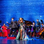 Carolina Gaitán Instagram - If you have the chance tonight try not to miss this "United In Song" on @pbs with @theamericanpops Thanks for this great invitation @lukefraziermusic I had a blast!!! 🍾✨✨🍾 Si tienen chance esta noche celebrando el año nuevo en @pbs estaré con mi música y acompañada por @theamericanpops cantando para Uds!!!🍾✨🍾✨🍾✨ Mi vestido hermoso del grandioso: @virgiliomadinah Besotes vuelan!!! 🍾✨🍾✨🍾 Atlanta, Georgia