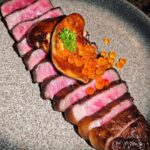 Chonlathorn Kongyingyong﻿ Instagram - Chez Milinne x CUT 🏠 • ร้านอาหารที่จริงใจสามารถสั่งทั้ง Tasting menu หรือ a la carte ก็ได้และไม่จำเป็นต้องสั่งครบทุกคน ราคาถ้าเทียบกับคุณภาพถือว่าเกินเบอร์ไปไกลมาก ปลาสดทุกชิ้น โปรตีนทุกชิ้นคุณภาพดีมากมาย Dry-aged yellowtail I Yuzu Carpaccio🐟 Hokkaido Scallop | Cod Roe I Hollandaise 🐚 Alaska King Crab I Mirepoix Stock🦀 Goose Foie Gras | Tofu🪽 Australian Lamb I Red Wine Mushroom🐑 Fillet Mignon, Mustard JusI Cauliflower Purée🐂 Raspberry I Mille-feuille🍓 #capcravin Chez Miline