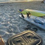 Drew Brees Instagram - Sitting on the beach, watching the sunset, kids in the water… Rugged Road cooler by my side… doesn’t get much better!!! @rugged_road_outdoors