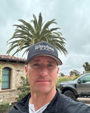 Drew Brees Instagram - Just got my @wrexham_afc hat in the mail. If you haven’t watched the Welcome to Wrexham series yet, I highly recommend it. Incredible Journey for that team and town! Ironically, I watched it on the plane flying over to London. Congratulations to @vancityreynolds @robmcelhenney for Believing! Here’s to the next promotion!