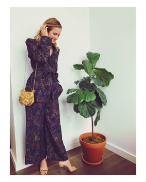Elizabeth Lail Instagram - Managed to keep a plant alive 🙌 thank you @sarahslutsky for helping me create this sustainable look Xx