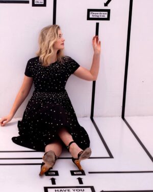 Elizabeth Lail Instagram - Thank you @nkdmag and @catherinepowell for this shoot and story. I feel like Alice in Wonderland/Phoebe from Friends/Torrence from Bring It On in this picture Xx