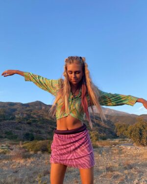 Emily Skinner Instagram - Hey good news! I’m starting a @depop and I’m going to be selling these four groovy tops + a lot more ! Buying second hand rather than new reduces water and energy consumption and doesn’t add to our overflowing landfills. It’s also so much more creative and fun ! Head to the link in my bio to shop my Depop and find me at @emilyskinner on the app! #depoppartner #depop 💟💚🌷🧚