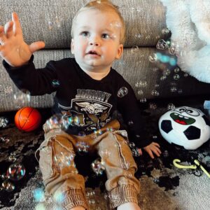 Heather Rae El Moussa Instagram - Pure joy. 🤍 Sharing a few little updates that make me smile: T’s a picky eater but loves hummus, fruit, peanut butter and almond butter 
He knows where his nose, hands, feet & tongue are.
He gives kisses and hugs
And is the happiest most loving angel all of the time 🥹