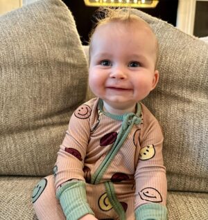 Heather Rae El Moussa Instagram - Friday mood: 😜 I blinked and he’s already sitting up all by himself, smiling for the camera giggling non-stop, and he has two teeth that came in & 2 more piercing through 🥹 Swipe for cuteness 🤍
