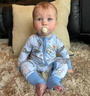 Heather Rae El Moussa Instagram - Friday mood: 😜 I blinked and he’s already sitting up all by himself, smiling for the camera giggling non-stop, and he has two teeth that came in & 2 more piercing through 🥹 Swipe for cuteness 🤍