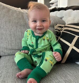 Heather Rae El Moussa Instagram - Friday mood: 😜 I blinked and he’s already sitting up all by himself, smiling for the camera giggling non-stop, and he has two teeth that came in & 2 more piercing through 🥹 Swipe for cuteness 🤍