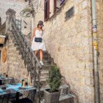 Isabel Oli Instagram - Kotor Old City Walls 🏰 A historic site enclosed by the city walls and has an incredible variety of churches. Also, you can dine and unwind at restaurants and cafes that offer a genuine Montenegro experience🤩 #TravelWithThePratties #Kotor #Montenegro Kotor, Montenegro