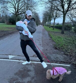 Jack Whitehall Instagram - Multitasking. I call this pose the ‘trying to feed a baby whilst trying to stop my dog feeding on a turd.’ Great way to burn some calories post Christmas lunch.