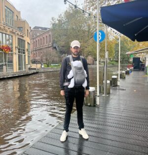 Jack Whitehall Instagram - Then and Now. This is me in Amsterdam today - very much in my dad energy. Swipe right to see the first time I came to the Dam aged 19 and went to a rave called white sensation. Goodbye space cakes and sex shops, Hello changing nappies on a barge.