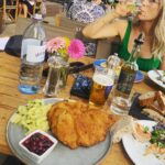 Jennie Garth Instagram - Berlin Day 2 Dave and I love to travel. It brings us together in a way like none other. We spend the days wandering. No plan. No distractions. No expectations. No one I’d rather get lost with than you babe❤️. 1) I live for lakes 2) I googled ‘places to eat on a lake’ which led us to a deserted dock with a rusty bell hanging in a tree. I clanged it of course. This boat came for us, and we just got on it! 3) Dave ate some meat things on a private island. I ate some non-meat things. 4) We took the boat back to shore. 5) We have an extensive collection of long arm selfies from wherever we end up. 6) Porsche in Berlin. 7) Quiet lake side moments like this are good for the soul. 8) The deserted dock. 9) German architecture is gorgeous. 10) Hours of drives like this…no idea where we are headed next! #travel #love Germany