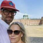 Jennie Garth Instagram - Berlin Day 2 Dave and I love to travel. It brings us together in a way like none other. We spend the days wandering. No plan. No distractions. No expectations. No one I’d rather get lost with than you babe❤️. 1) I live for lakes 2) I googled ‘places to eat on a lake’ which led us to a deserted dock with a rusty bell hanging in a tree. I clanged it of course. This boat came for us, and we just got on it! 3) Dave ate some meat things on a private island. I ate some non-meat things. 4) We took the boat back to shore. 5) We have an extensive collection of long arm selfies from wherever we end up. 6) Porsche in Berlin. 7) Quiet lake side moments like this are good for the soul. 8) The deserted dock. 9) German architecture is gorgeous. 10) Hours of drives like this…no idea where we are headed next! #travel #love Germany