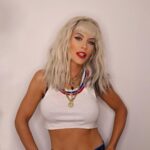 Jenny McCarthy-Wahlberg Instagram - Im no @gwenstefani but it sure was fun dressing like her for 90s night tonight. ❤️. @maskedsingerfox Makeup: @beautybyangee Hair: @scottkinghair Wardrobe: @warrenalfiebaker Necklace: @dylanlex