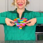Kelli Erdmann Instagram - 🚨Fun and easy way to give back this season🚨 Join me and build your very own heart made out of @lego bricks, post it with the hashtag #BuildtoGive & the LEGO Group will donate a LEGO set to a child in need of play! #LEGOPartner #SuperPowerOfPlay