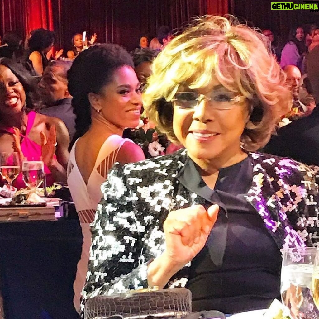 Kelly McCreary Instagram - This photo from the @Essence #BlackWomenInHollywood 10th Anniversary celebration was just sent to me by a friend. I had never seen it before, but you can see the admiration, adulation on my face as the room gave the legendary Ms. Diahann Carroll her well-deserved ovation. It was the only time I had ever shared space with the woman I first encountered as a little girl, lolling on the floor of our tv room, up past my bedtime, while my mom watched Dynasty. She was one of my first encounters with black glamour, and I had no idea that in her role as the villain of that show, she was— and not for the first time— breaking Hollywood’s rules about what a kind of role a woman like her ought to be able to play. She blazed the trail for all of us who came after her. What a gift to have been able to celebrate her, with gratitude, joy and pride, while she was here. May she Rest In Peace. (Photo by @bevysmith via @ijessewilliams)
