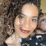 Kelly McCreary Instagram - Leaving 2021 with peace in my spirit. This was a helluva full year for our family. We grew in number and in love and strength. Indigo has already hit the reset button for us, renewing our values, our sense of purpose, humbling and teaching and delighting us each and every day. We endured multiple hospitalizations, a lot of sickness, and thankfully saw a lot of healing. I vomited more times than you can possibly imagine. And then remember that time I burned my face — my FACE!— while cooking? Vaccinations opened the door to our first dinner out, first flight, first family gatherings after 15 months of staying our butts at home. Spent more beautiful time with my original family than I have been able to do in years. Not taking those moments for granted anymore. Went from a camera roll full of dog photos to one full of baby photos (sorry, Motown). My eyebrows, in general, looked great. And I managed to get this holiday makeup on with one hand while holding this baby. Accomplishments, y’all. Change, too. Trauma. Healing. Fun. Miracles. And so much love. We made it through because of that. Happy New Year to you. I wish you a year with more of what you want and all of what you need. 💙💙💙
