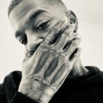 Kid Cudi Instagram - New ink by @_dr_woo_ 😮‍💨😮‍💨😮‍💨😮‍💨 🩻 Skeleton Hand Man My 10th Woo piece. What should I get next? 🤔 Appreciate u Woo God 🙏🏾✨❤️🌹