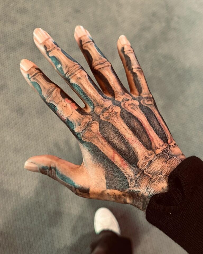 Kid Cudi Instagram - New ink by @_dr_woo_ 😮‍💨😮‍💨😮‍💨😮‍💨 🩻 Skeleton Hand Man My 10th Woo piece. What should I get next? 🤔 Appreciate u Woo God 🙏🏾✨❤️🌹