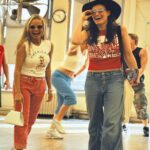 Kristin Chenoweth Instagram - October 20 marks 10 days until @wicked_musical’s 20th anniversary… be prepared to be absolutely sick of us for the next 10 days!!! Rehearsals in 2003… these outfits are officially back in style which I think makes us old @idinamenzel?? 💚🩷🧹 #flashbackfriday #wicked20 New York, New York
