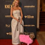 Kristin Chenoweth Instagram - family night out at the #astraawards!! 💖 #theastras @hollywoodcreativealliance Dress: @christopherjohnrogers Shoes: @gianvitorossi Jewelry: @swarovski & @considerthewldflwrs Thunder’s Outfit: @christiancowan Styles by @debswatson