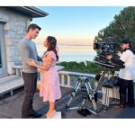 Lacey Chabert Instagram - Working with @kevin_mcgarry_w means having a wonderful scene partner, lots of laughs, and wearing my tallest shoes and still needing to stand on an apple box in every single scene. 🤣 *good news is, when they were on his closeup, I got to wear my warm puffy coat because there wasn’t a chance they’d even see the top of my head in the shot 😂 Thank you to our wonderful set photographer @allister.foster for the first pic which is a still shot from the movie. #TheWeddingVeil