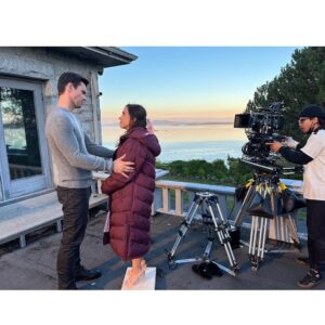 Lacey Chabert Instagram - Working with @kevin_mcgarry_w means having a wonderful scene partner, lots of laughs, and wearing my tallest shoes and still needing to stand on an apple box in every single scene. 🤣 *good news is, when they were on his closeup, I got to wear my warm puffy coat because there wasn’t a chance they’d even see the top of my head in the shot 😂 Thank you to our wonderful set photographer @allister.foster for the first pic which is a still shot from the movie. #TheWeddingVeil