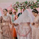Neeti Mohan Instagram - Overjoyed and Beyond Grateful for such an auspicious occasion in our family. Papa had to miss our wedding due to health reasons but this time, in his presence the wedding felt complete. Thank you God for this 🙏🏼🥹 We feel blessed, as with folded hands we welcome Thakur Family in our lives. Welcome home @whokunalthakur 🌹🫶🏻 Ab tum bhi Mohana gaye ho! Golu! our choti bacchi @muktimohan wishing you a lifetime of happiness, prosperity and love ❤️ Sabka khayaal rakhna aur apna sabse zyaada. Mud ke na dekho Dilbaro 😥 #KunalKoMiliMukti Thank you for capturing these precious moments @themadeinheaven 🫶🏻