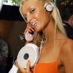 Paris Hilton Instagram - I’ve been feeling like a #Y2K Pop-Punk Princess Paris lately 👸🏼🎸 What’s your favorite 2000’s girl rock anthem? #ThatsHot #Sliving #Throwback 🎧⚡️