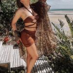 Pearl Thusi Instagram - Brown sugar babe… 🍯🍹🧉 Shades & sun hat : @karllagerfeld @preview_designer_collection Azulik Private Lodge, Mozambique