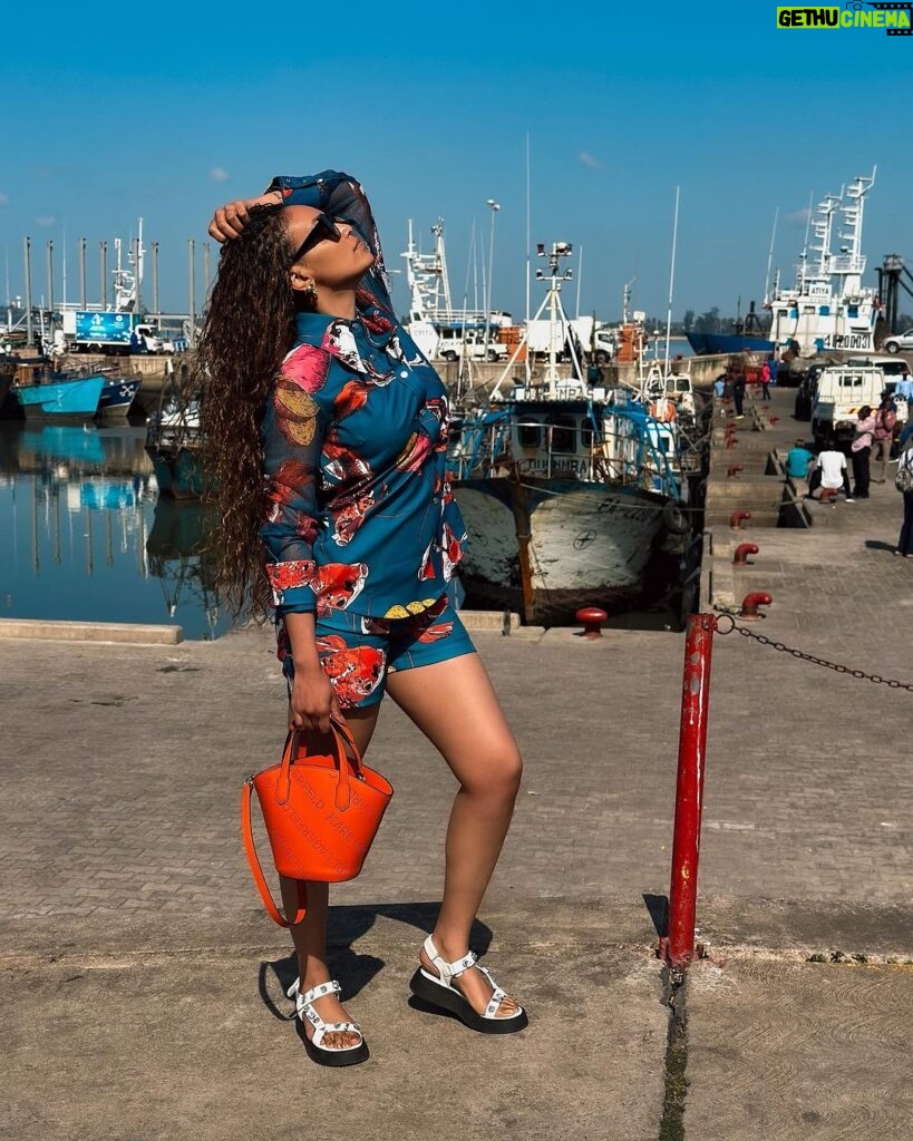 Pearl Thusi Instagram - Baddest fish in the sea 🐠🐋🐬 Fit : @thebemagugu Shoes, shades & bag - @europaart @preview_designer_collection @karllagerfeld Santa Maria Mozambique