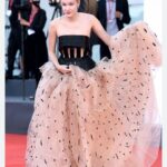 Polina Pushkareva Instagram - Mistakes I made at the Venice Festival this year The Venice Film Festival — done. It was my fourth film festival and every time you learn during the process what and how to do to achieve great results. And what I’ll add to my plan for the next film festival to avoid jambs. 1. Take the look to change clothes after the red carpet. Because it’s unrealistic to go back to the hotel by boat in heavy dresses. Plus, sitting through a movie for 3 hours when you can’t breathe is also not an option. 2. Accredit the assistant and give her a ticket so that she can help on the red carpet. 3. Hire only one make-up artist for all festival days. You meet so many people that it becomes emotionally uncomfortable to work with unfamiliar specialists. The fewer people who work with you and the more stable they are, the better. 4. Do your makeup in advance and leave at least 2-3 hours to shoot content. Red carpets are always scary and emotionally difficult. That’s why it’s important to have time to manage everything smoothly. 5. Set aside separate time for work when there are no events. I have a full-time business, and it’s physically very difficult to work during the festival. 6. Order 2-3 additional looks in case something is not delivered on time. And make sure that all items arrive 2-3 days before check-in. 7. Take a full-time photographer and videographer with you, because you need to shoot a lot of content. It's better to delegate these tasks to a pro. In general, I’m happy with the results of Venice 2023 and I think everything went great. You can flip through the photo carousel where I am at my first festival in 2020 and compare my growth. Venice, Italy