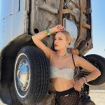 Polina Pushkareva Instagram - Conclusions on Coachella 2023: the guide on how to survive Coachella is a challenge. You're trying to chill and enjoy the atmosphere, music, dating, but it's very hard to be in the desert. Wanna share my thoughts after the fest and what I will do next year. 1.Wear only gathered hairstyles and fix them well with hairspray. The wind is fuckingly strong, so the loose hair quickly turns into a nest. 2. Always carry a lipstick with you to quickly fix your makeup. If you can do without any lipstick, it's even better. Plus, dust sticks on the lipstick which is quite unpleasant. 3. Wear cool and not super comfortable outfits for photo shoots in the desert. And it’s better to go to the festival in comfortable clothes, in which you can spend the whole night. 4. The face mask is a must-have. Be sure to take a backpack with you (not just a beautiful handbag) and put into it antihistamines, medicines for stomach and any other pills that you may need. Anything can happen in the desert, and the medical center is not always nearby. 5. Live alone and meet friends at the festival. That's perfect. You can wake up and fall asleep whenever you want, do whatever you want and not adapt to other people's plans. 6. Come to the festival by 7 p.m. Unless, of course, someone you love performs during the day. After 5 hours there you get so tired that you don't enjoy it anymore. And the top artists start performing in the evening. 7. Take a tripod. I took all the photos in this trip myself. I just put the camera and posed as much as I wanted. If content is your priority, take a tripod, set aside one hour and calmly shoot yourself in different locations. Btw, which outfit do you like most of all? Coachella, California