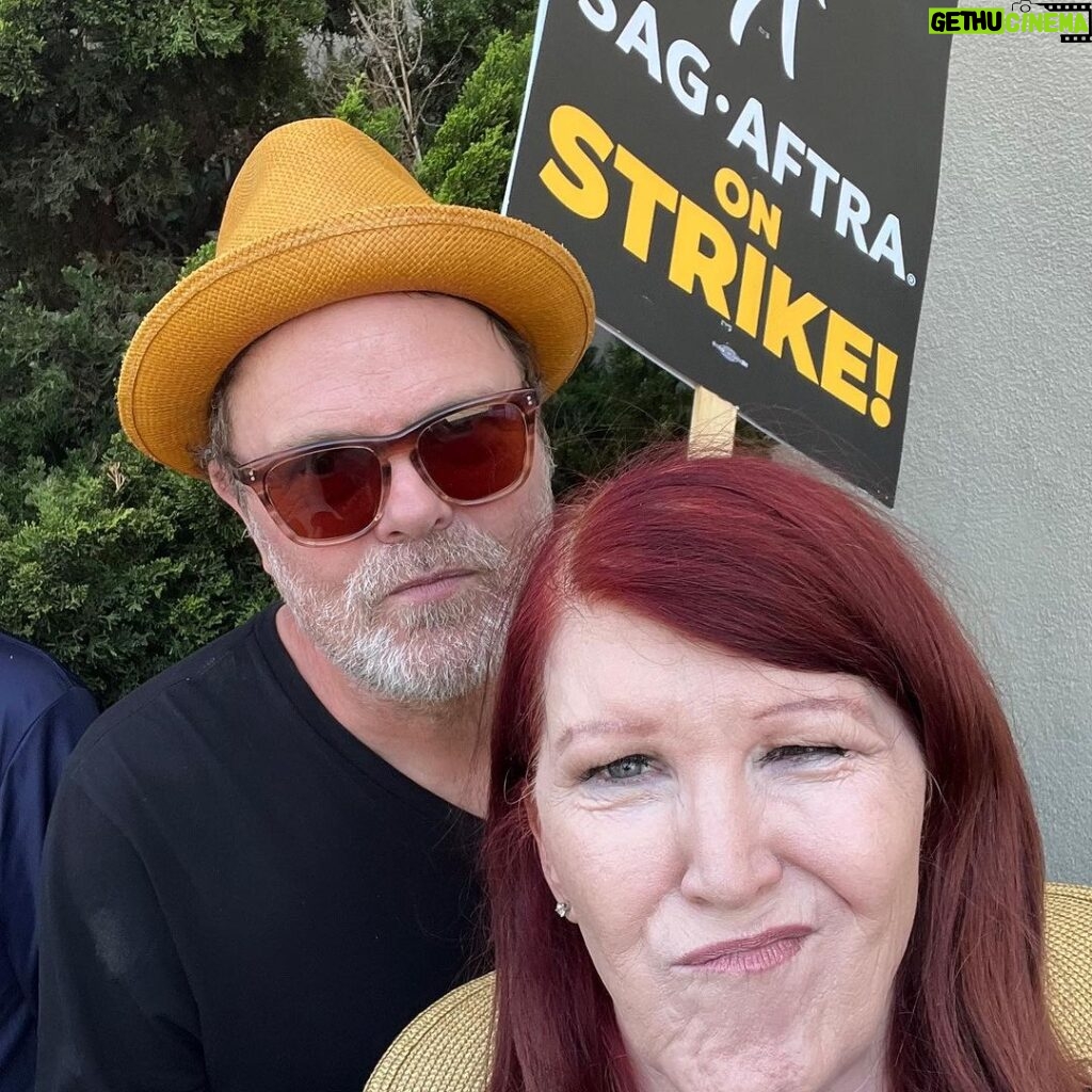 Rainn Wilson Instagram - Ran into old friends at the picket lines today at Warner Brothers! Folks, this is about middle-class writers and actors trying to feed their families and pay their mortgages. This new streaming business model that has (impetuously and without any long-term consideration) transformed the entire industry over the last 5 years, has completely screwed over working class creatives in Hollywood in all kinds of ways - more draconian contracts, little to no residuals, and less writers room hires. For instance: remember the 57 BILLION MINUTES of The Office viewed on Netflix in 2020? Our “residuals” for that historic run were beyond pathetic. Netflix made out ok, however - a 27% jump and profits of 9B that year. Follow: @sagaftra for more info.