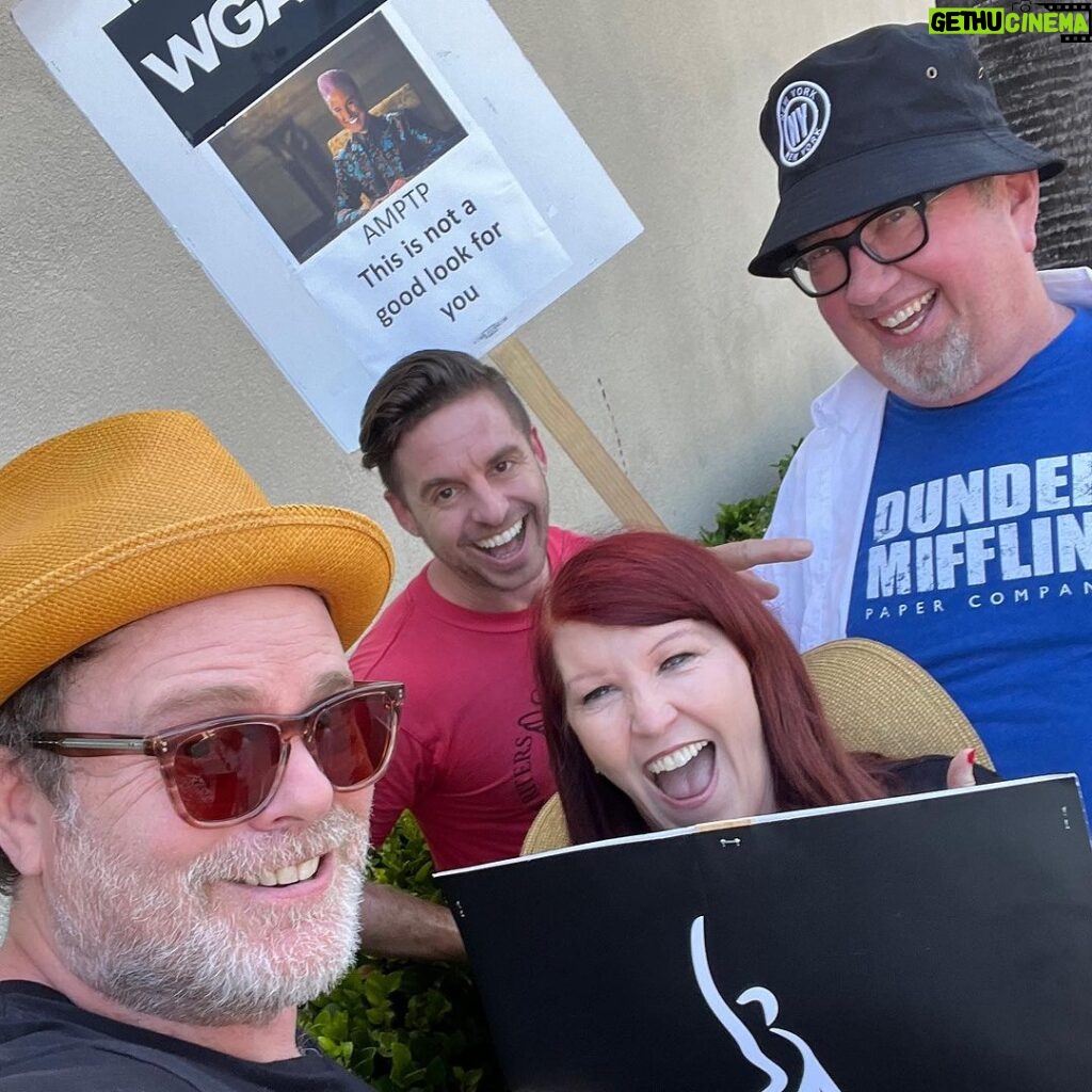 Rainn Wilson Instagram - Ran into old friends at the picket lines today at Warner Brothers! Folks, this is about middle-class writers and actors trying to feed their families and pay their mortgages. This new streaming business model that has (impetuously and without any long-term consideration) transformed the entire industry over the last 5 years, has completely screwed over working class creatives in Hollywood in all kinds of ways - more draconian contracts, little to no residuals, and less writers room hires. For instance: remember the 57 BILLION MINUTES of The Office viewed on Netflix in 2020? Our “residuals” for that historic run were beyond pathetic. Netflix made out ok, however - a 27% jump and profits of 9B that year. Follow: @sagaftra for more info.
