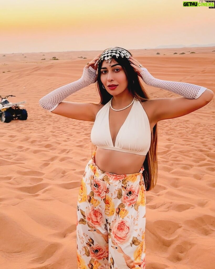 Ruma Sharma Instagram - The temperature is high here but so is my mood ✨ #dubaidesert . . #rumasharma #dubaidesertsafari #desertphotography #sunandsand #goldenhourlight #sundowner #dubaitravel #dubaitravelblogger #travelwithlove Dubai Desert