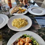Sanjana Sanghi Instagram - Questa e vita 💕☀️🌊 The last few days were spent in some stunning Ligurian towns along the Italian Riviera. Camogli, though, has my heart. Quaint. Undiscovered. People full of love & life. Food full of color & warmth. Focaccia fresh out of the oven by local bakers. Sea food fresh out of the Ligurian sea. Little colourful homes strewn across the hillside, mesmerising, as though a painting made at leisure. I learned that given a choice, I can sit by a street drinking coffee and people watch for days. I also learned that speed boats across choppy sea waters frighten me?🤷🏼‍♀️ • Camogli - PortoFino - Santa Margarita • #SOnVacay #OffDuty Camogli, Riviera Ligure, Italia