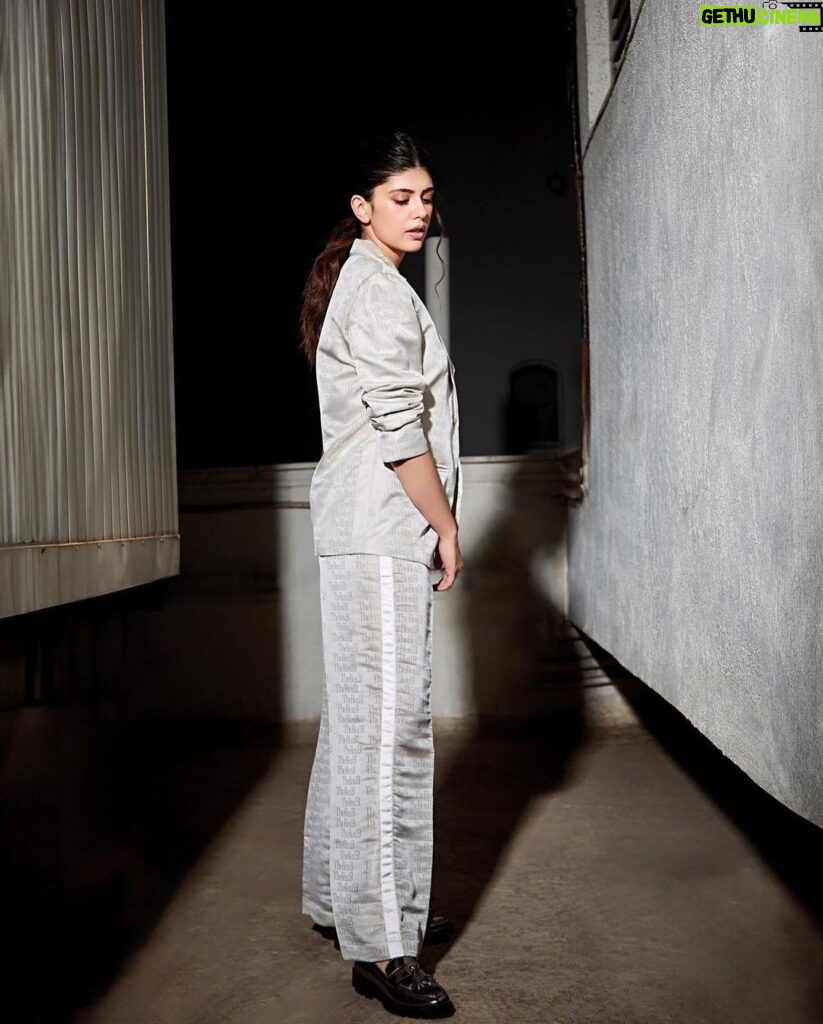 Sanjana Sanghi Instagram - For this tomboy, stepping out on the weekend looks like grabbing a baggy pantsuit & her favourite vintage brogues from New York 🙋‍♀️