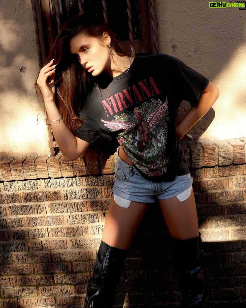 Savannah Clarke Instagram - N I R V A N A __________________________________ Nirvana is a place of perfect peace and happiness, like heaven. ___________________________________ #Nirvana #RockTshirts #DenimCutOffs #BlackBoots #Hike #RunyonCanyon #LetsGetFit #ExcerciseForYourMind #Outdoors #BackToNature #LaWalls #LightandShadePhotography #TakenOnAIphone #LALiving #RechargeYourSoul #ootw ____________________________________ Los Angeles, California