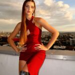 Savannah Clarke Instagram - J U S T I N R E A C H ___________________________________ Believe you can and you are half way there. ____________________________________ #RedDress #JustInReach #GoldenHours #CollectiveTrend #PortraitsInspire #CreativeWorld #Believe #BelieveInyou #LightAndShade #AussieInLA ___________________________________