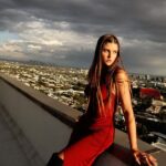 Savannah Clarke Instagram - J U S T I N R E A C H ___________________________________ Believe you can and you are half way there. ____________________________________ #RedDress #JustInReach #GoldenHours #CollectiveTrend #PortraitsInspire #CreativeWorld #Believe #BelieveInyou #LightAndShade #AussieInLA ___________________________________