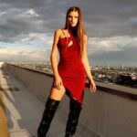 Savannah Clarke Instagram - J U S T I N R E A C H ___________________________________ Believe you can and you are half way there. ____________________________________ #RedDress #JustInReach #GoldenHours #CollectiveTrend #PortraitsInspire #CreativeWorld #Believe #BelieveInyou #LightAndShade #AussieInLA ___________________________________