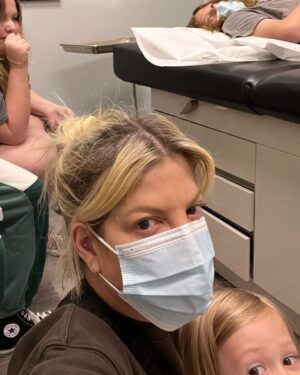 Tori Spelling Instagram - Let’s talk about MOLD…
-
Here we are again at Urgent Care. We’ve all been on this continual spiral of sickness for months. Sick. Get better. To get sick again. Used to think… well that’s what happens when you have young kids in school. They just continually bring sicknesses home. But, when it gets to the point where they are at home sick more than being in school we had to reassess what was going on. Kids will be kids but when you have your youngest (10 and 6) so sick they are sleeping all day and say they feel dizzy even standing I knew something bigger was going on. Enter Mold inspection! Thx to Sean at Pacific Scope Inspections who came out and discovered extreme mold in our home 😱. The pieces all started to fall into place. Has anyone ever been thru Mold Infections? You just keep getting sick, one infection after another. Respiratory infections. Extreme allergy like symptoms too and like my poor Finn skin rashes as well. As we sit here today in Urgent Care … watching everyone getting swabbed and first up Finn with Strep throat ✅and high fever of 103. We now know that when the house was labeled a health hazard and not live able that wording was FACT. We now GET IT! It’s hard to just uproot a huge family especially in midst of all feeling so sick and in bed. But, we now will vacate the home asap. Looking for an @airbnb or @vrbo or hotel till we can even grasp what to do. We are just renters so looks like moving is in our eminent future as well. Grateful we have renters insurance. We’d be lost how to tackle this without. And, special non shout out to our public school district for repeatedly not believing our kids were as sick as they’ve been continually. Just get them in school right 😡? Has anyone been thru Mold sickness? The deeper dive I do online sadly I see how common this is 😢 #mold #moldinfection 🧿