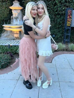Tori Spelling Instagram - It’s official… my baby girl Buggy 🐞 is 15! So proud of the incredible human you are @stella_mcdermott08 . You have always led with kindness and empathy. Despite bullying in many areas of your life you continue lead with hope and optimism and are an inspiration to girls everywhere. Your heart is giant! And, you excel at everything you do. Baker, Master Chef winner, crochet wizard, designer, DIY dream, makeup master, fashionista, and extreme animal lover. Best big sister and fur baby mama. You inspire me daily and I aspire to be the human you are when I grow up! I love you my #bffbaby Thx @katanarobata for the most incredible birthday dinner party for my girl. And, my friend @shaesavin you are the best ❤️ And, @claymakescakes always the best cakes! You totally nailed Stella’s vintage vision. And, @misskimdow your hair color OMG ❤️! Thx to her besties and family for always loving and supporting Stella. xoxo