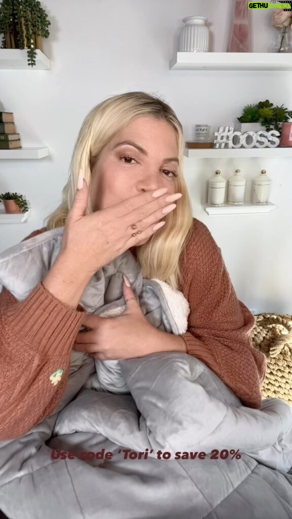 Tori Spelling Instagram - I am OBSESSED with my weighted blanket from @lunablankets 💝 it is sooo soothing and helps me relax into a restful sleep after busy days.  Use code TORI for 20% off your order, link in bio to shop!