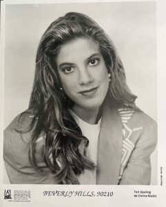 Tori Spelling Instagram - 33 years ago today Beverly Hills, 90210 aired and changed this teen girls life forever and the amazing fans, friends, and family it created for a lifetime! - Yup, this is my 1st pic taken by FOX for my character Donna Martin. It was taken during the making of the pilot. I was 15 in this pic, before nose job, bleach, and knowing how to pose. I was just grateful to be there. I was the producers daughter and was hoping to just prove my own worth. Hey, I was already Violet Bickerstaff in Saved By the Bell ( not my dads show). Look at me 33 years later still pointing out that just bc my Dad was the producer on 90210 I still got other parts on my own by auditioning just like every other actor. Lol. Old triggers die hard. - Here’s what I would say to that 15 year old girl in that photo. You ARE worth something. A lot! You will go on to not only OWN the character of Donna Martin but make her into one of the worlds most iconic and beloved characters in tv hisTORI. Don’t listen to anyone that makes you feel any less than you are! You can do anything you set your mind, heart, and soul towards doing! You ARE your father’s daughter. So, be proud to be Aaron Spelling’s daughter because you inherited all his amazing producing skills! Not to mention sTORItelling ability and creativity! The apple 🍎 doesn’t fall far from the tree. You are smart, kind, funny, beautiful inside and out, creative, powerful, and beyond determined! You will always prevail. And, will kick ass in this world! Oh, btw 15 year old Tori/Donna funny side note to America’s most infamous virgin you will go on to have 5 kiddos lol . Oh, and btw they will rule the world too bc they are YOU! #beverlyhills90210 #donnamartin #kindnessalwayswins #beyoutiful #beyou Thx @darrenmartin for this pic and always believing in me!