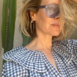 Sarah Paulson Instagram - Using my arm to prop up my head is a great way to hide my dead cactus while showing off my beautiful @shopdoen blouse. Get it while it’s hot kids.