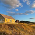 Milla Jovovich Instagram - What an insanely magical experience we had staying in the gorgeous town of Bonavista #newfoundland! Our cabin was literally heaven. Every morning I would wake up an hour before my daughter @everanderson just to sit on the porch and stare at the sea, drink my tea and do a crossword. After Ever finished work on her new movie #peterpanandwendy in the evening, we would go for walks, climbing the rocky cliffs leading down to the ocean. I loved watching her jumping from rock to rock, scrambling around like a little gazelle. At this time of year the weather has been incredible, the wind is fierce but warm, both exhilarating and relaxing. It’s really been unforgettable getting to know this gorgeous, rugged bit of paradise. Thank you to all the wonderful people of this community for welcoming us with open arms!✨
