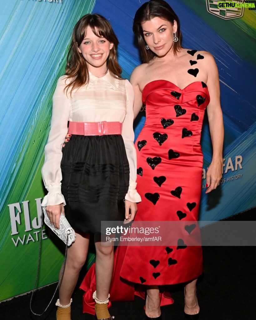 Milla Jovovich Instagram - Want to give a huge thank you to our amazing glam team from both @everanderson and I for making us both look gorgeous at last night @amfar gala!
Make up: @hollysilius 
Hair: @officialdanilohair 
My dress: @jeremyscott 
Ever’s dress: @miumiu
