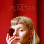 Aurora Aksnes Instagram - 🩸HEATHENS🩸

The stone, the dirt, the dust
The unforgiving promise made to us
Unworthy of your light, your god

your touch… 

We’re guided by the lust

🩸OUT TOMORROW🩸
This piece holds a special place in my heart. I’m so excited for it to finally be with all of you 🥀
Photo by @_xinli_